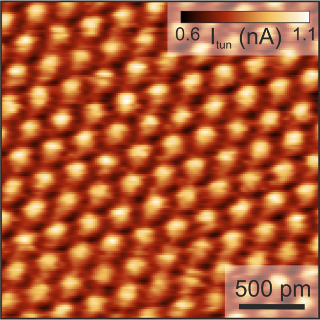 Scanning tunnelling image of HOPG (PtIr tip). A qPlus sensor with conductive tip allows for simultaneous AFM/STM operation. Scanning tunnelling image of HOPG (PtIr tip). A qPlus sensor with conductive tip allows for simultaneous AFM/STM operation.